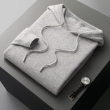 Glenn | MEKANA I ELEGANTNA KAPUUTSWEATER